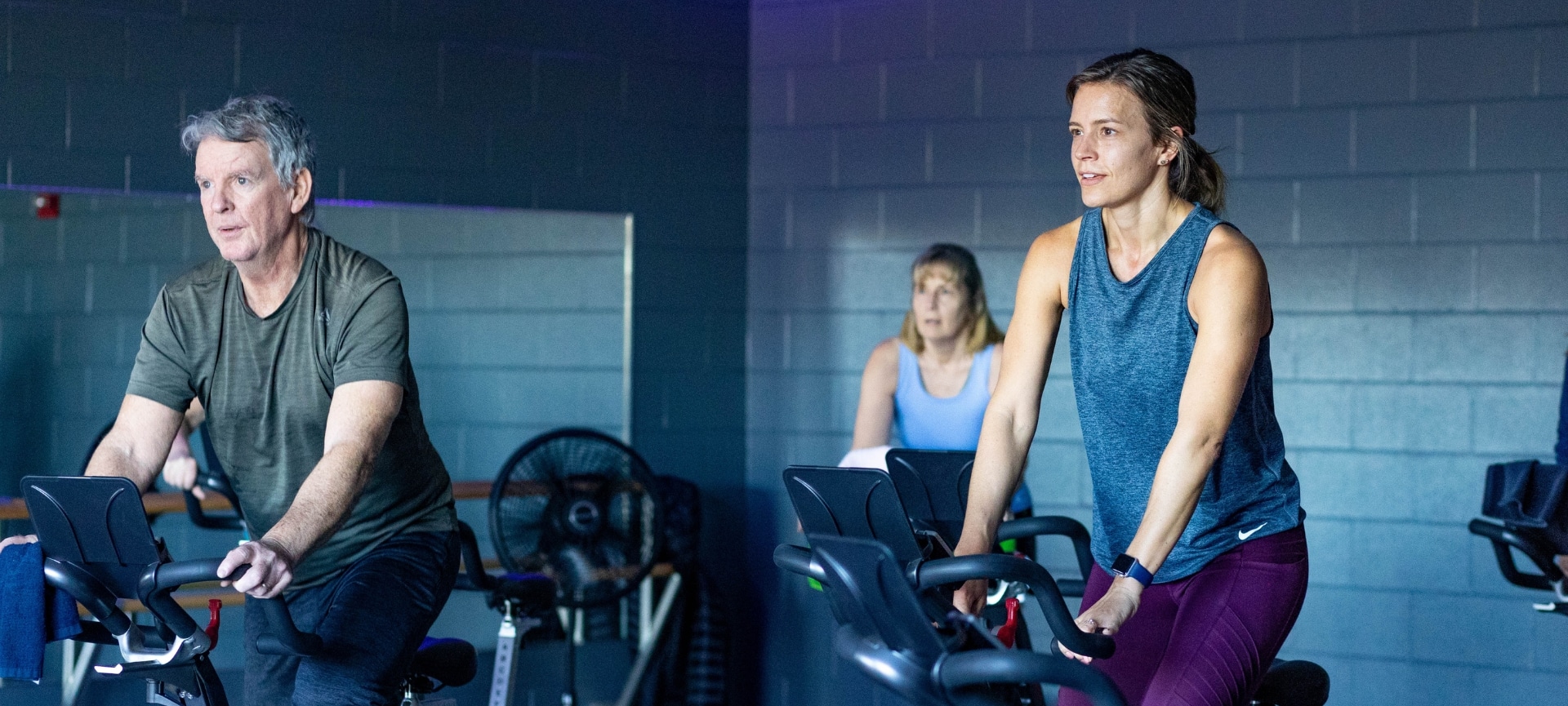 a group of people in a gym