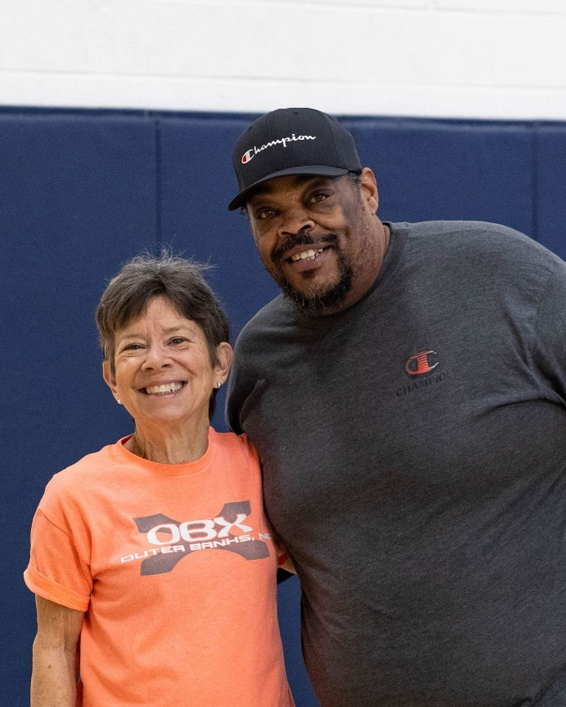 a man and woman posing for a picture