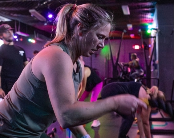 a group of people in a gym